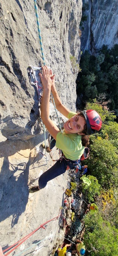 Reaching for the next hold while climbing